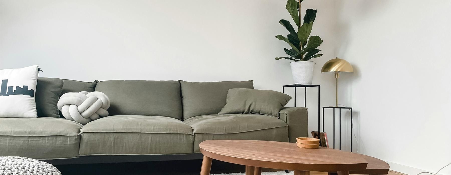 a living room with a couch and a coffee table