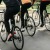 a group of people riding bikes